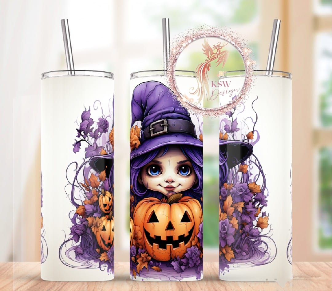 Halloween-themed tumbler with a witch design and pumpkin on a wooden surface.