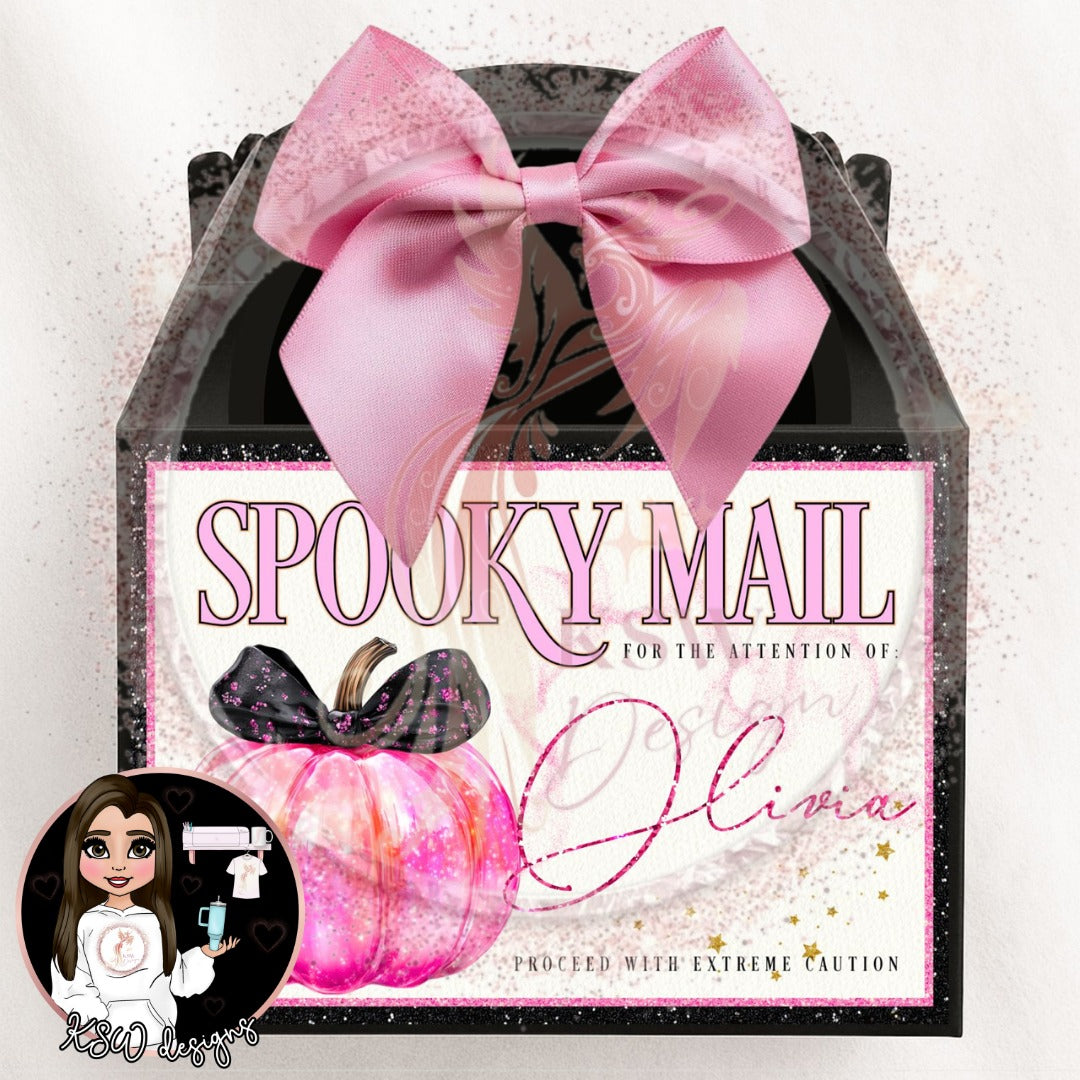 Decorative mailbox with pink bow and personalized 'Spooky Mail' text on a light background