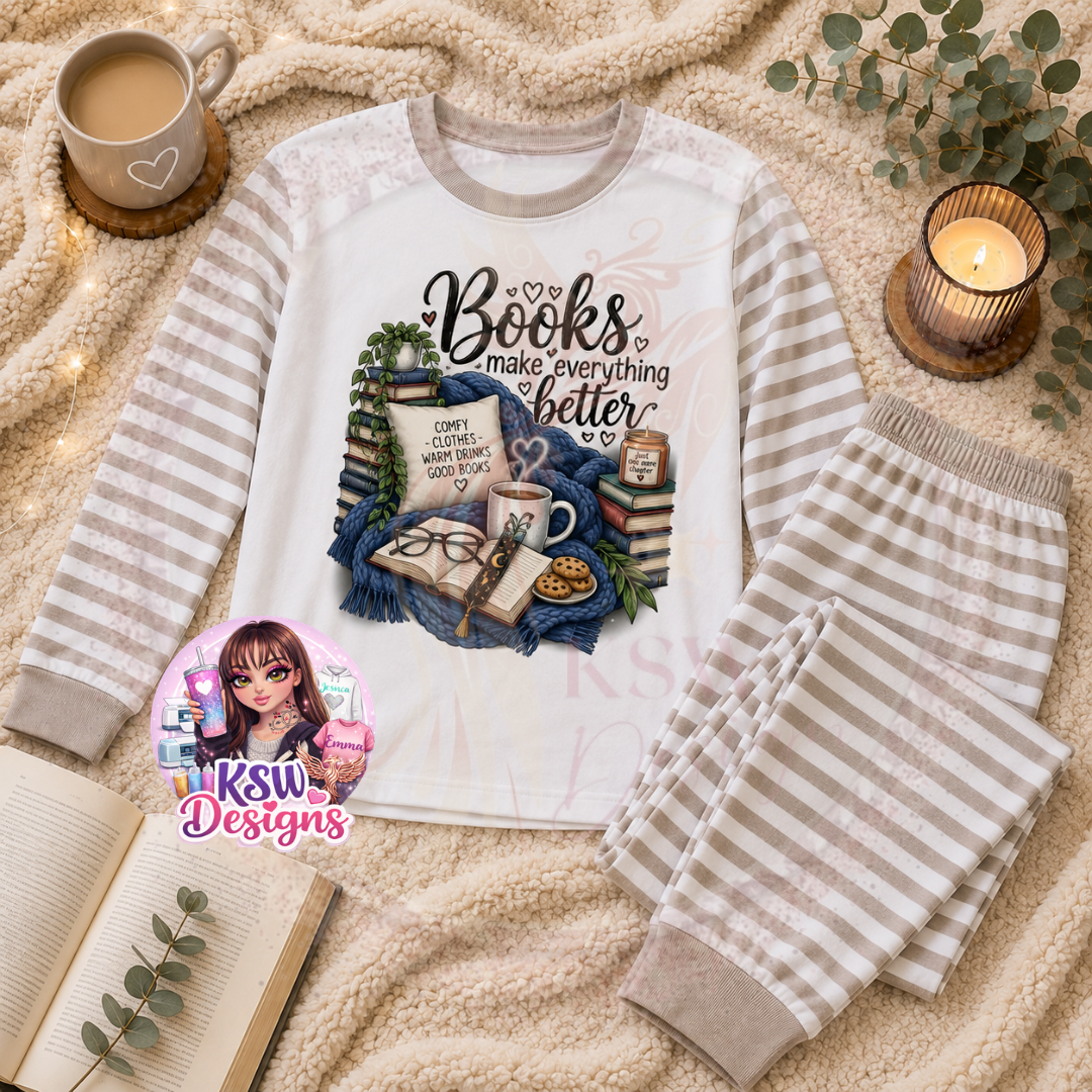 Books Make Everything Better adult book lover pyjama set featuring stacked books, open book, cosy blanket, warm drinks and reading snacks shown on beige striped pyjamas