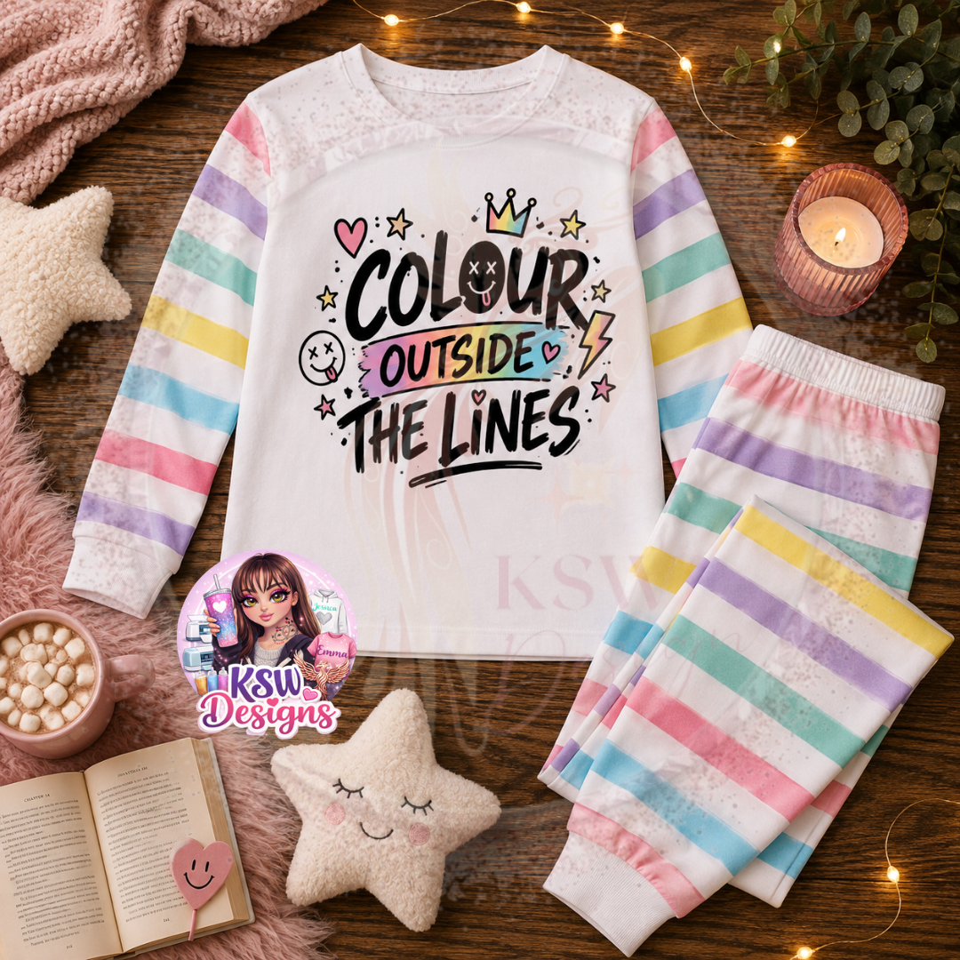 Colour Outside The Lines colourful adult pyjama set shown with pastel rainbow striped sleeves and matching bottoms