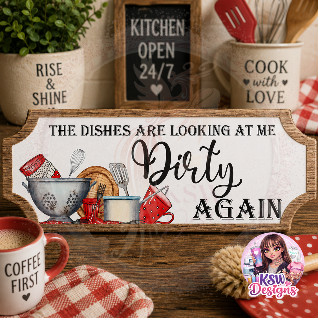 Funny kitchen acrylic sign reading The Dishes Are Looking At Me Dirty Again with kitchen utensil artwork and rustic wood-effect border.