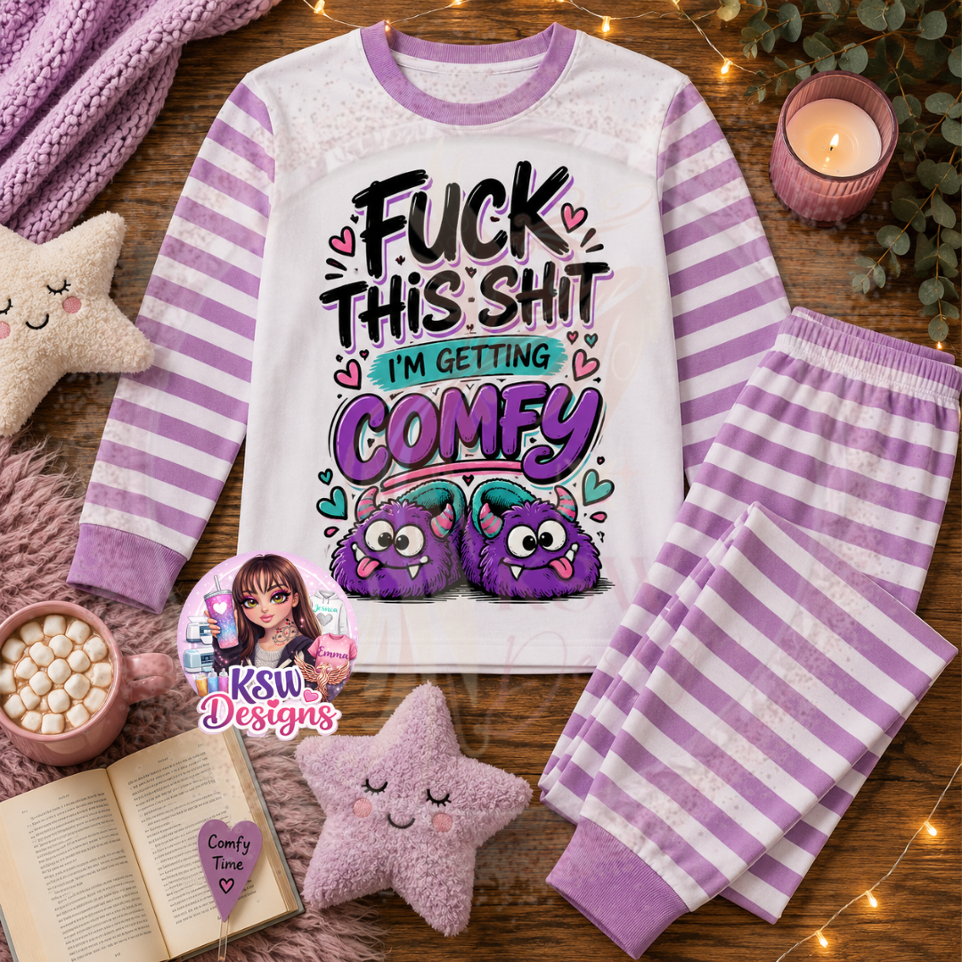 Fuck This Shit I’m Getting Comfy adult pyjama set shown in lilac stripe with cute purple monster design
