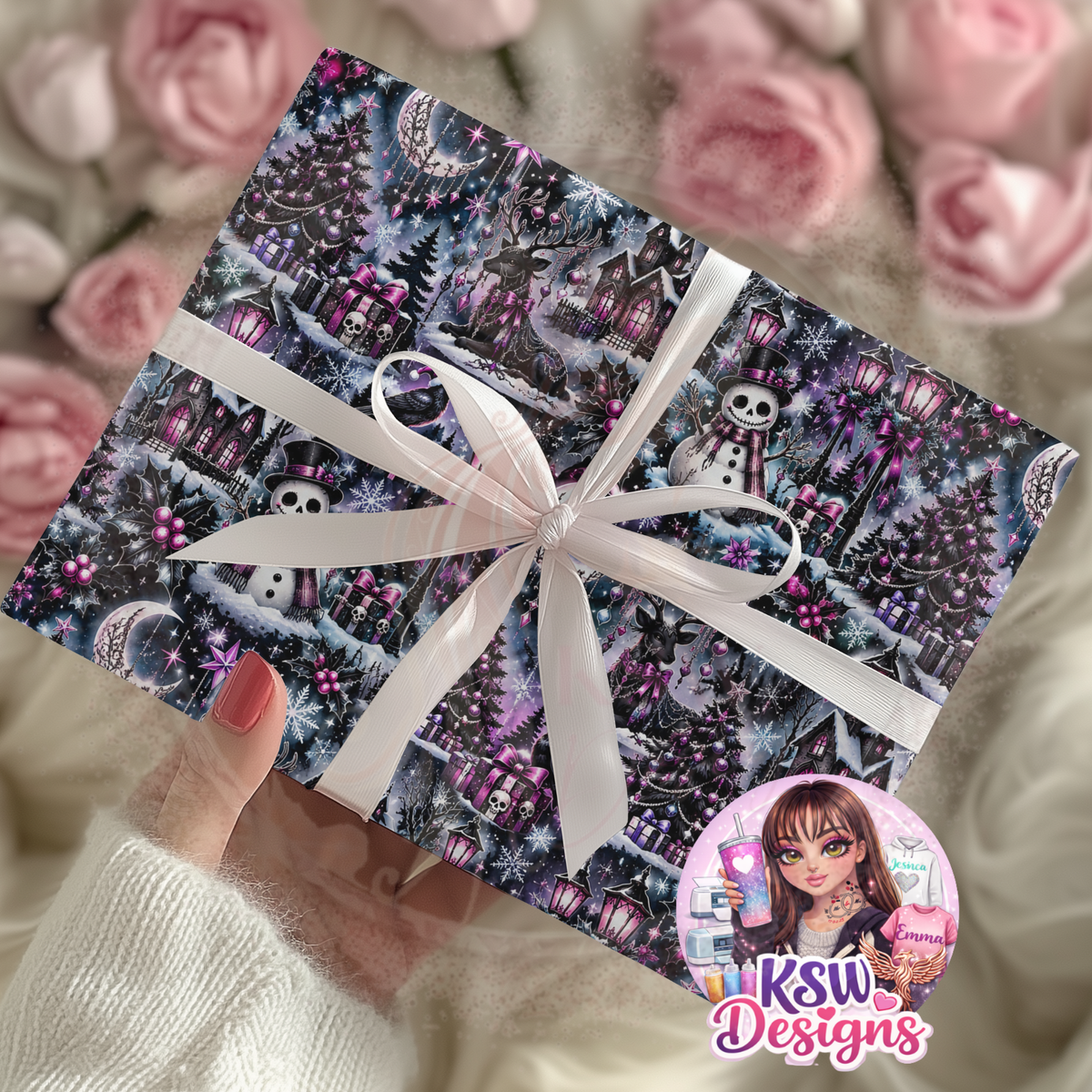 Christmas present wrapped in purple gothic winter wonderland paper featuring skull-faced snowmen, decorated Christmas trees, antlered deer and snowy gothic houses, tied with a white ribbon.