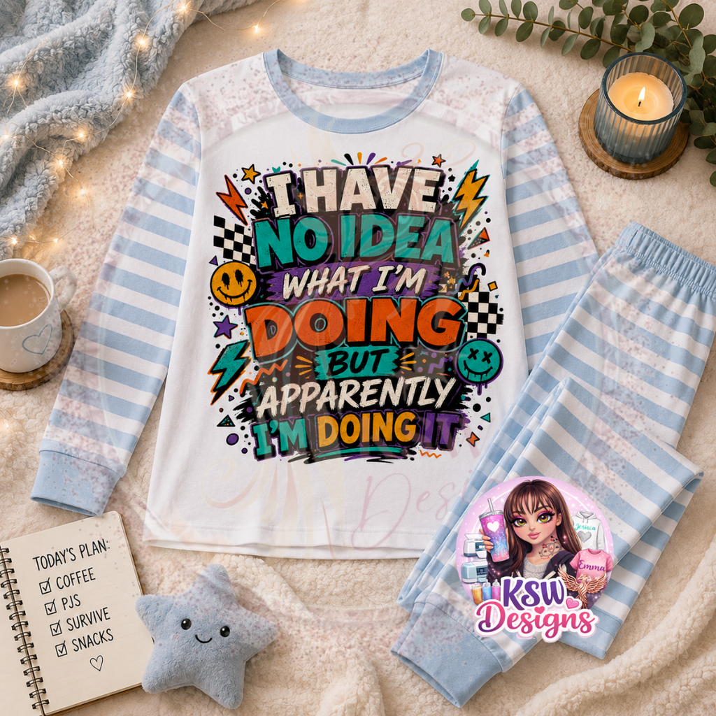 I Have No Idea What I’m Doing But Apparently I’m Doing It funny adult pyjama set with colourful retro slogan design shown on baby blue striped pyjamas