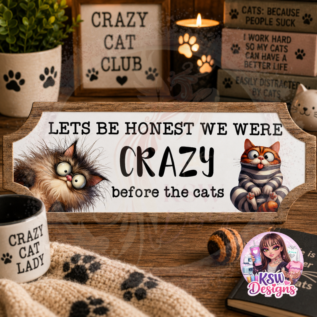 Funny cat lover acrylic shelf sign reading Let's Be Honest We Were Crazy Before The Cats with cartoon cat artwork and rustic wood-effect border.