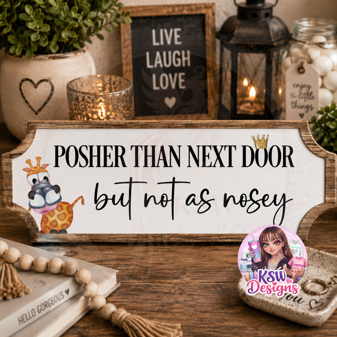 Funny acrylic shelf sign reading Posher Than Next Door But Not As Nosey with giraffe illustration and rustic wood-effect border.