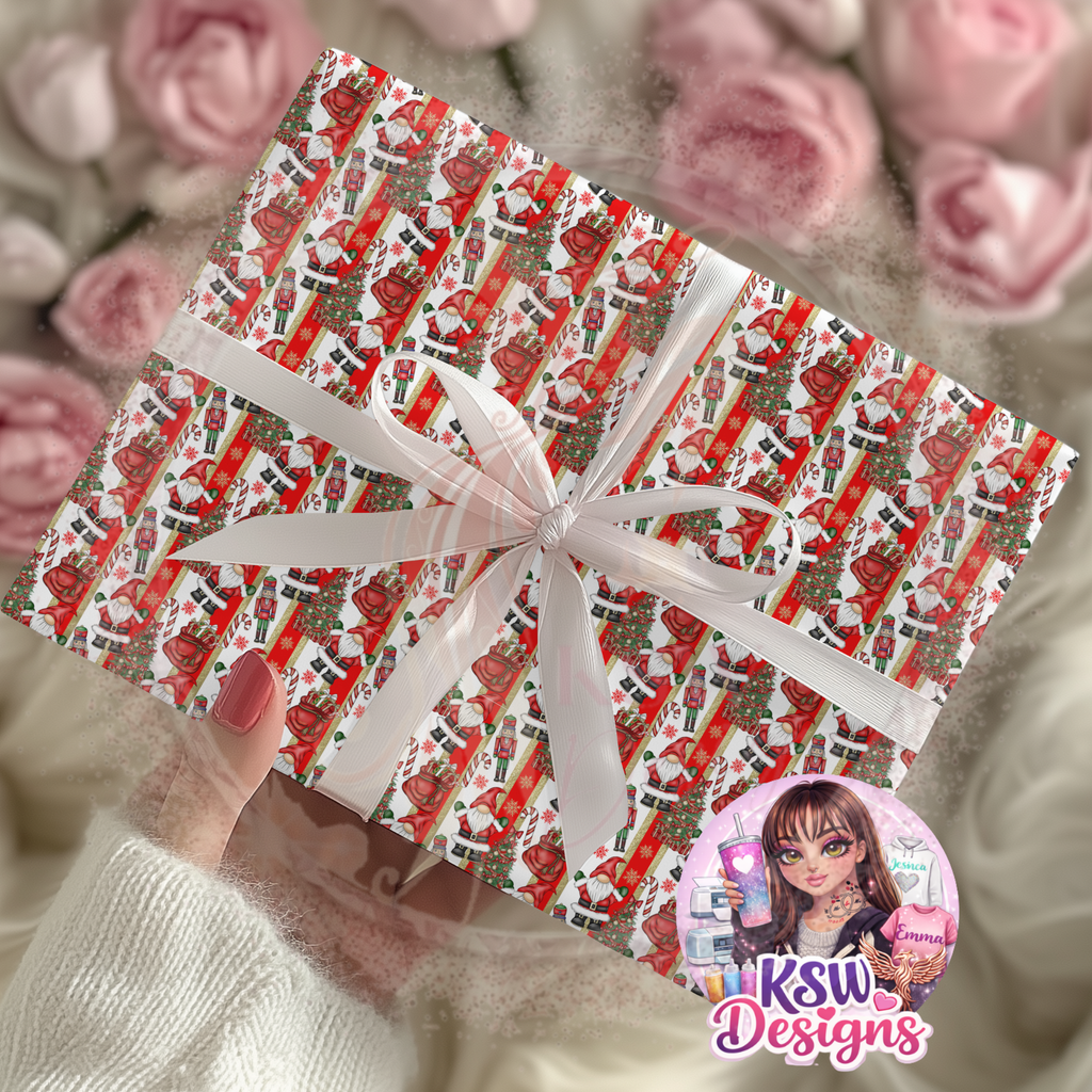 Christmas present wrapped in Santa's Gonk Parade Version 2 A3 gift wrap featuring small repeating Santa gonks, nutcrackers, candy canes, Christmas trees and festive stripes, finished with a white ribbon.