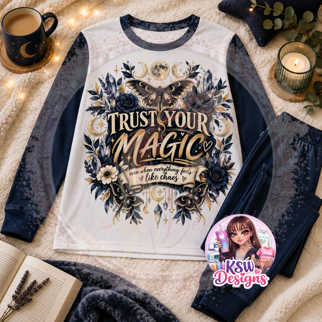 Trust Your Magic adult pyjama set featuring celestial moths, moon phases, crystals and dark floral details shown on navy block pyjamas
